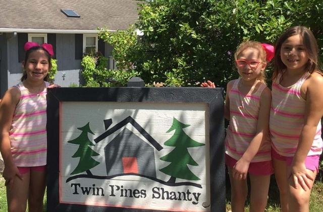 Guest and Random Pics 3 children in front of Twin Pines sign